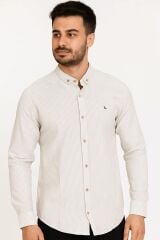 Erkek Zarif çizgili deseni ve modern kesimiyle dikkat çeken bu uzun kollu gömlek, hem günlük kullanımda hem de özel davetlerde stilinizi tamamlar. Gün boyu rahatlık sunar TAŞ